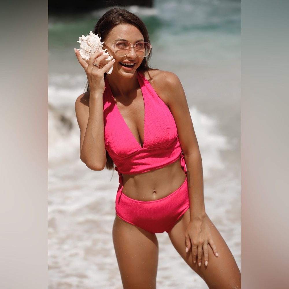 Hot pink halter top bikini with high-wasted bottoms